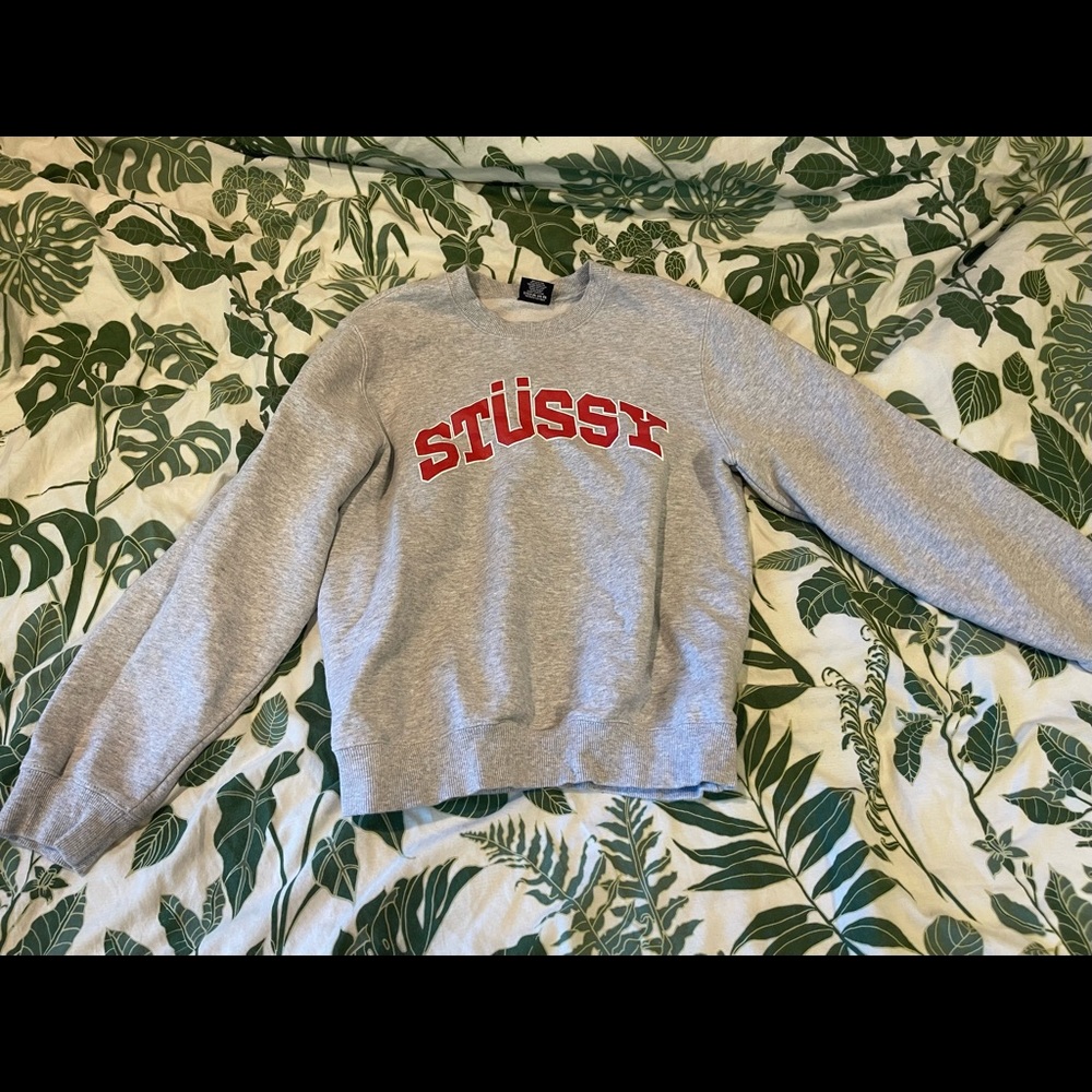 Stussy sweater from Urban Outfitters